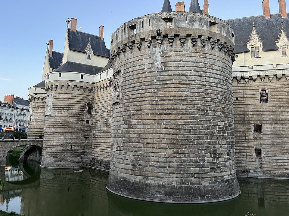 A round tower rising from the moat